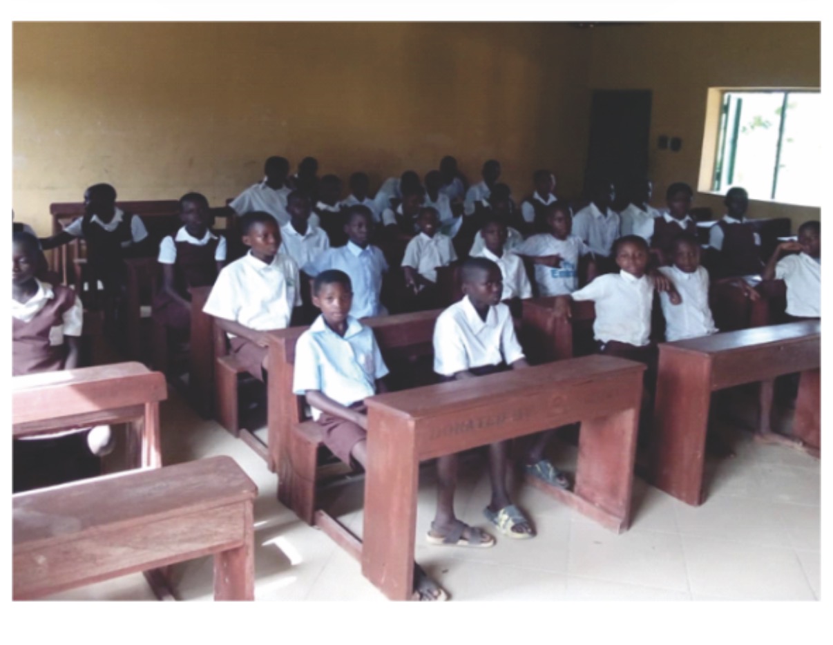 Students seated at classroom desks in a secondary school